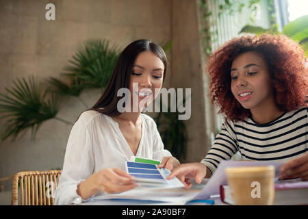 Two promising interior designers discussing new project Stock Photo