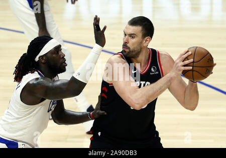 Los Angeles, California, USA. 11th Nov, 2019. Toronto Raptors' Marc Gasol (33) is defended by Los Angeles Clippers' Montrezl Harrell (5) during an NBA basketball game between Los Angeles Clippers and Toronto Raptors, Monday, November 11, 2019, in Los Angeles. Credit: Ringo Chiu/ZUMA Wire/Alamy Live News Stock Photo