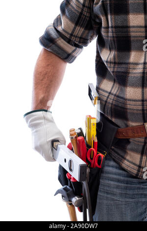 Carpenter isolated on a white background, he wears leather work gloves. He is holding the level. Work tools industry construction and do it yourself h Stock Photo