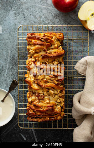 Apple pecan pull apart bread with cream cheese frosting Stock Photo