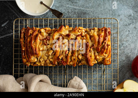 Apple pecan pull apart bread with cream cheese frosting Stock Photo