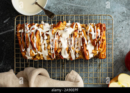 Apple pecan pull apart bread with cream cheese frosting Stock Photo