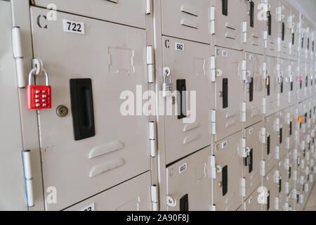 Line of lockers with the lock in the hallway of campus in primary school Stock Photo