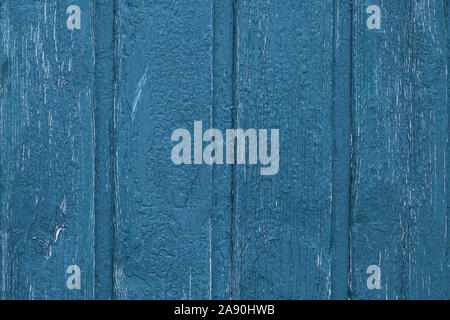 Shabby wood texture background. Vintage wooden painted fence. Blue shabby planks, desk surface. Weathered timber. Old boards. Stock Photo