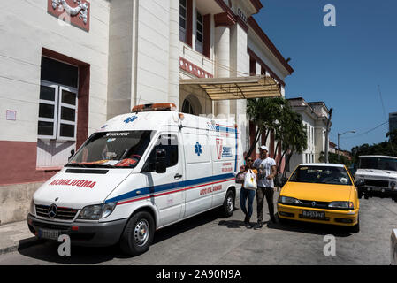 An ambulance parked outside Hospital Universitario 'General Calixto Garcia' - Universidad y Calle J, Vedado,, Havana, Cuba. Stock Photo