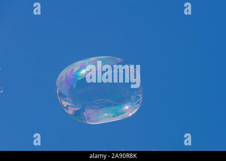 Bubbles created by a busker / street performer , in front of  The National Gallery, Trafalgar Square, London, UK Stock Photo