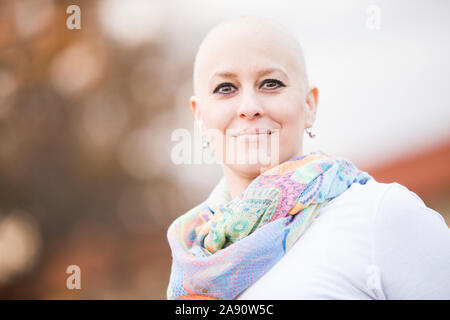 Portrait of a beautiful bold women during cancer treatment of chemotherapy. Stock Photo
