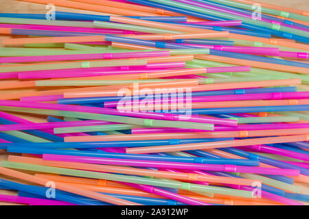 Multi coloured/colored plastic straws Stock Photo