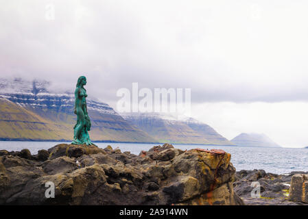 Statue of Selkie or Seal Wife in Mikladalur, Faroe Islands Stock Photo