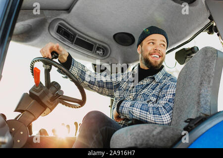 Smiling man driving Stock Photo
