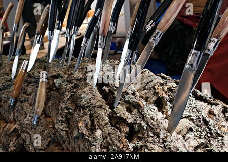 traditional handicraft Sardinian clasp knives on a cork Stock Photo