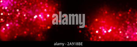 Valentines red and black background with sparkling lights bokeh. Copy space Stock Photo