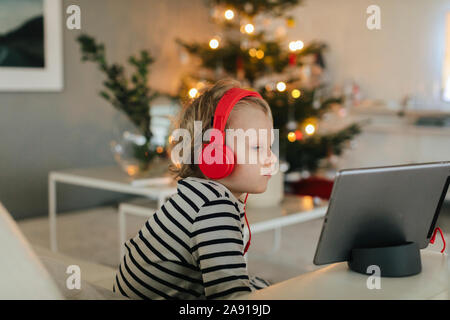 Boy using digital tablet Stock Photo