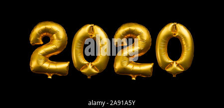 2020 written with golden balloons isolated on black background, new year party greeting card Stock Photo