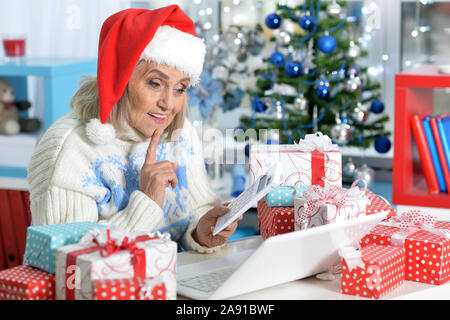 Close up portrait of woman using laptop Stock Photo