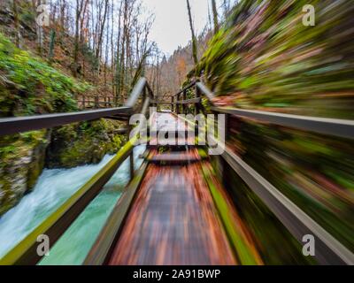 Wooden pathway in Kamacnik canyon near Vrbovsko in Croatia Europe intentionally blurry representing maximum utmost speed speedy fast movement Stock Photo