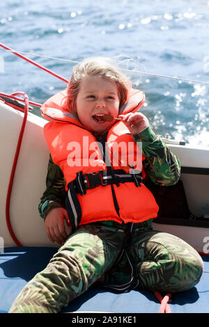 Smiling girl on boat Stock Photo