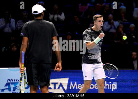 Joe Salisbury (right) celebrates during his doubles match on day three of the Nitto ATP Finals at The O2 Arena, London. Stock Photo