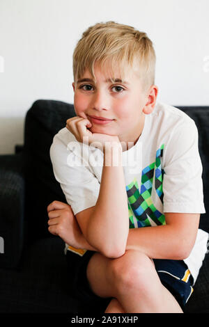 Boy looking at camera Stock Photo