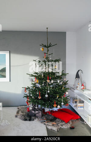 Christmas tree in living room Stock Photo