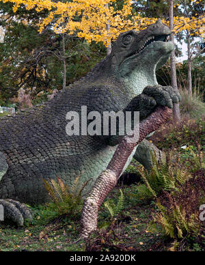 A dinosaur sculpture in Crystal Palace Park in London. These are the first dinasour sculptures in the world - inaccurate by modern science knowledge. Stock Photo