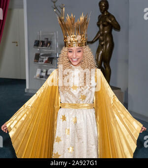 Nuremberg, Germany. 12th Nov, 2019. Benigna Munsi, the new Nuremberg Christ Child, is standing in her robe at the Nuremberg State Theatre during the official costume rehearsal. The 17-year-old was chosen as the Christ Child for the next two years and will traditionally open the Nuremberg Christkindlesmarkt on 29 November. Credit: Daniel Karmann/dpa/Alamy Live News Stock Photo