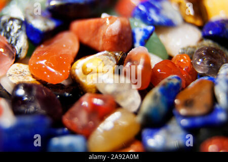 colored stones of different sizes lying in a pile Stock Photo
