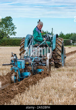 British National Ploughing Championships, Lincoln, UK - A vintage tractor ploughing Stock Photo