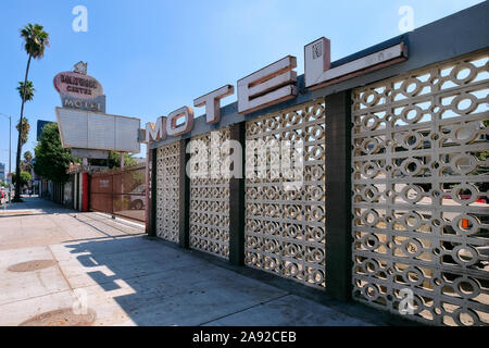 Entrance and illuminated advertising of the Hollywood Center Motel on Sunset Boulevard in Hollywood, Los Angeles, California, USA Stock Photo