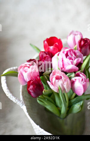 Tulips in basket Stock Photo