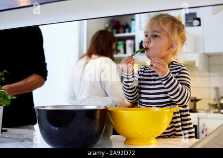 Girl in kitchen Stock Photo