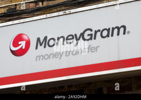 Essex, UK - August 27th 2019: The MoneyGram logo above the entrance to a shop in Essex, UK. Stock Photo