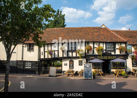 Essex, UK - August 27th 2019: The exterior of historic timber-framed building of the Welsh Harp public house in the town of Waltham Abbey in Essex, UK Stock Photo