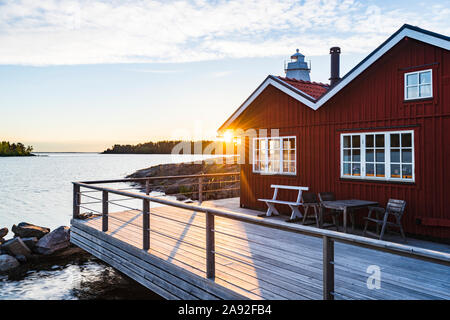 Wooden house at sea Stock Photo