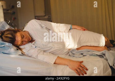 Woman in delivery room Stock Photo