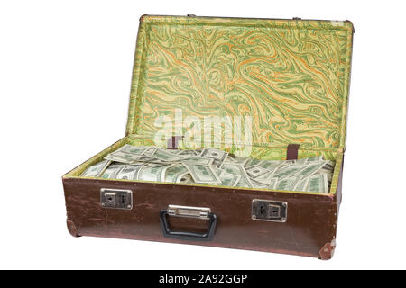 old opened brown suitcase full of hundred dollar banknotes isolated on white background. Stock Photo