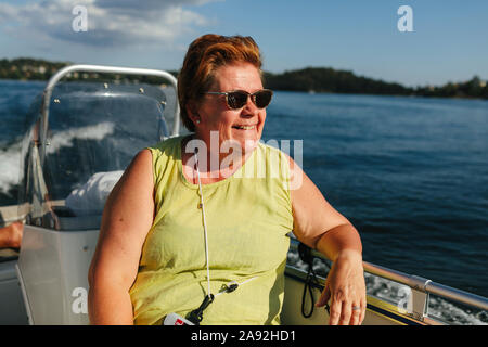 Woman on boat Stock Photo