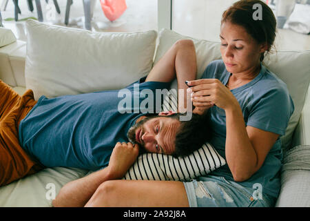 Couple on sofa Stock Photo