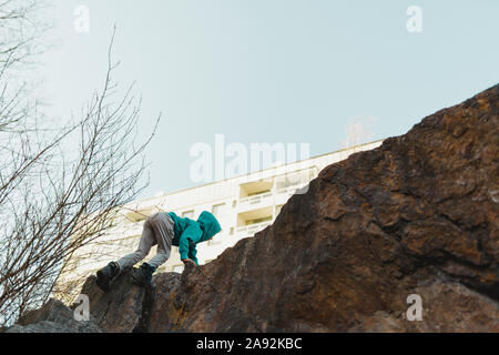 Boy climbing Stock Photo