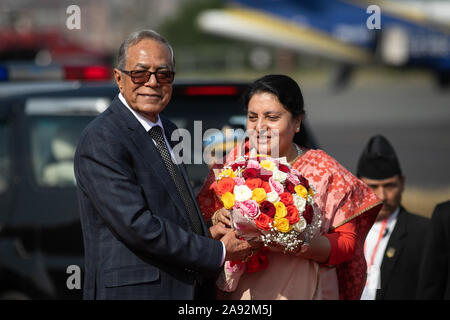 Kathmandu, Nepal. 20th Nov, 2019. President of Bangladesh, Abdul Hamid (R) receives a bouquet of flowers from Nepal's President, Bidhya Devi Bhandari (L) upon his arrival at Tribhuvan International Airport. President of Bangladesh is on a three-day official goodwill visit to Nepal at the invitation of Nepal's President. Credit: SOPA Images Limited/Alamy Live News Stock Photo