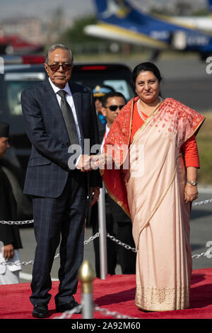 Kathmandu, Nepal. 20th Nov, 2019. President of Bangladesh, Abdul Hamid (L) and President of Nepal, Bidhya Devi Bhandari (R) shake hands during a welcome ceremony at Tribhuvan International Airport. President of Bangladesh is on a three-day official goodwill visit to Nepal at the invitation of Nepal's President. Credit: SOPA Images Limited/Alamy Live News Stock Photo