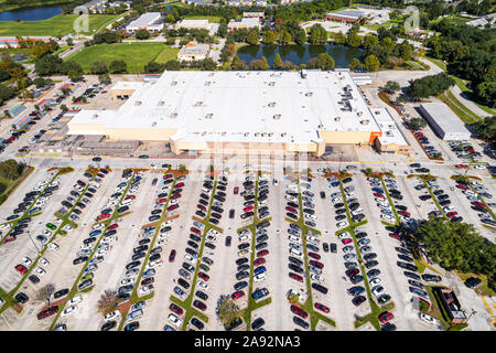 St Saint Cloud Florida,Walmart Big-Box Supercenter discount department store,outside exterior,exterior front entrance parking lot,aerial overhead bird Stock Photo