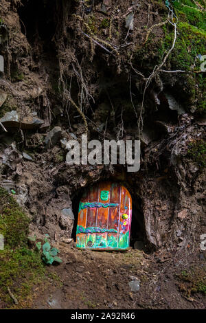 A fairy door in a woodland area. Stock Photo