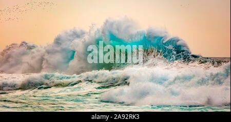 Waves off the Na Pali coast of Kauai; Kauai, Hawaii, United States of America Stock Photo