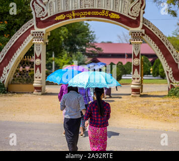 Girls walk to school for studying weaving; Bagan, Mandalay Region, Myanmar Stock Photo