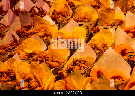 Fried seafood assortment ready to be consumed from the fish market in Barcelona Stock Photo