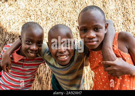 Ugandan children, Tombs of Buganda Kings at Kasubi; Kampala, Central Region, Uganda Stock Photo