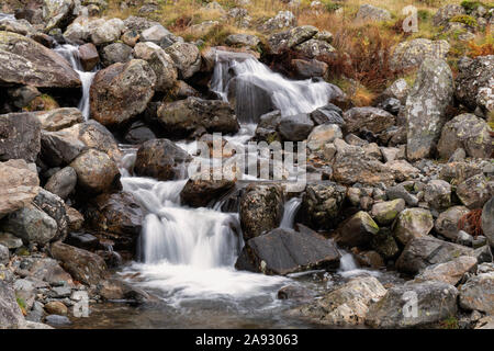 River cascading down series of small waterfalls near Thirlmere in the Lake District National Park Stock Photo