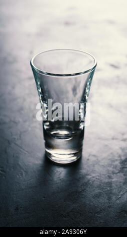 beer bottle, transparent glass, gray background, red wine bottle, coffee beans, coffee beans Stock Photo