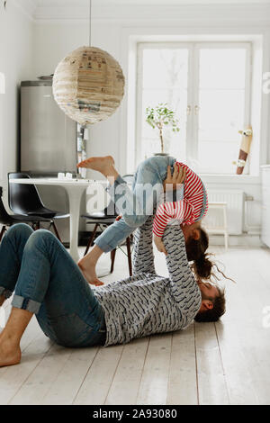 Father playing with daughter Stock Photo